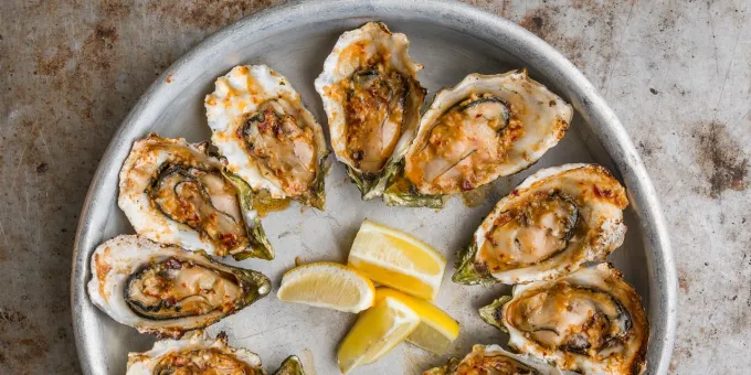 Barbecued oysters at Hog Island Oyster Company in Marshall, California