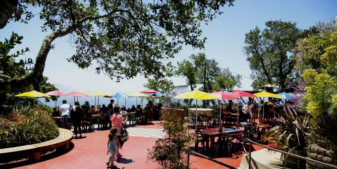 Outdoor dining space at Nepenthe overlooking Big Sur